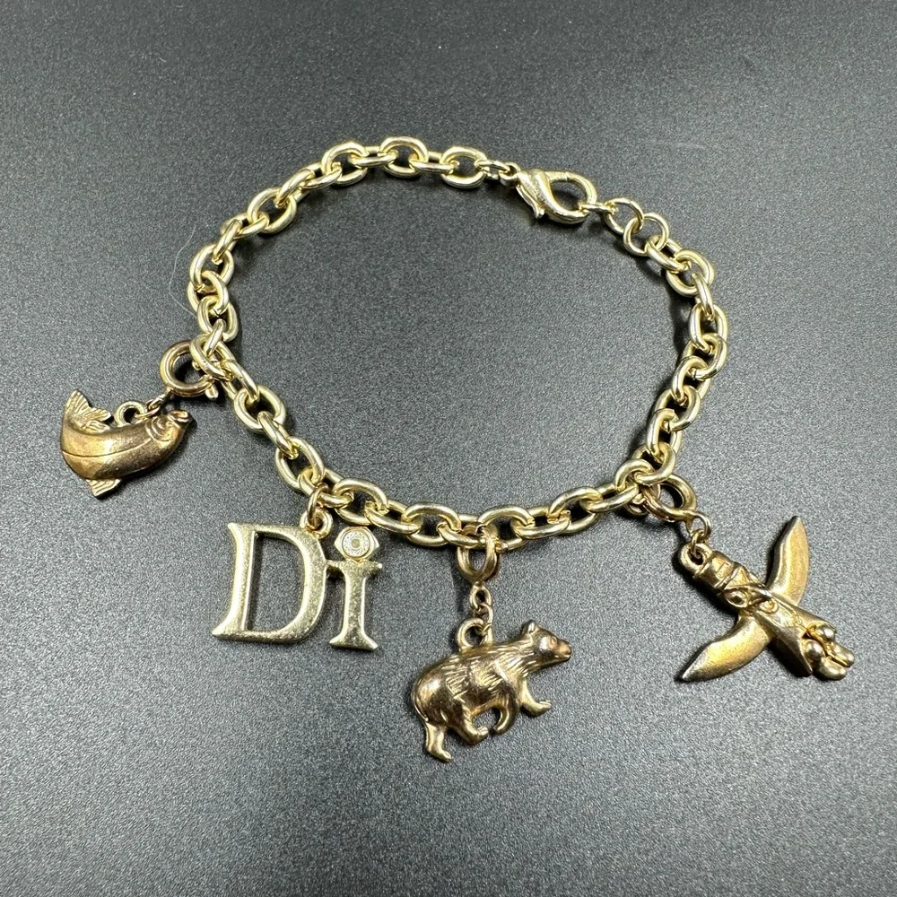 Diamond International DI Gold Tone Charm Bracelet Totem Bear Fish